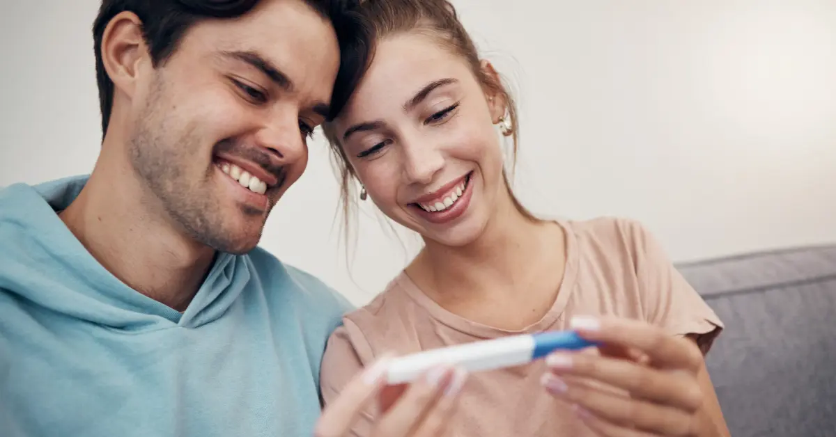 Premature ovarian insufficiency addressed in a fertility consultation with a couple and a caring doctor.